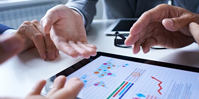 test management Business people using pen,tablet,notebook are planning a marketing plan to improve the quality of their sales in the future.
